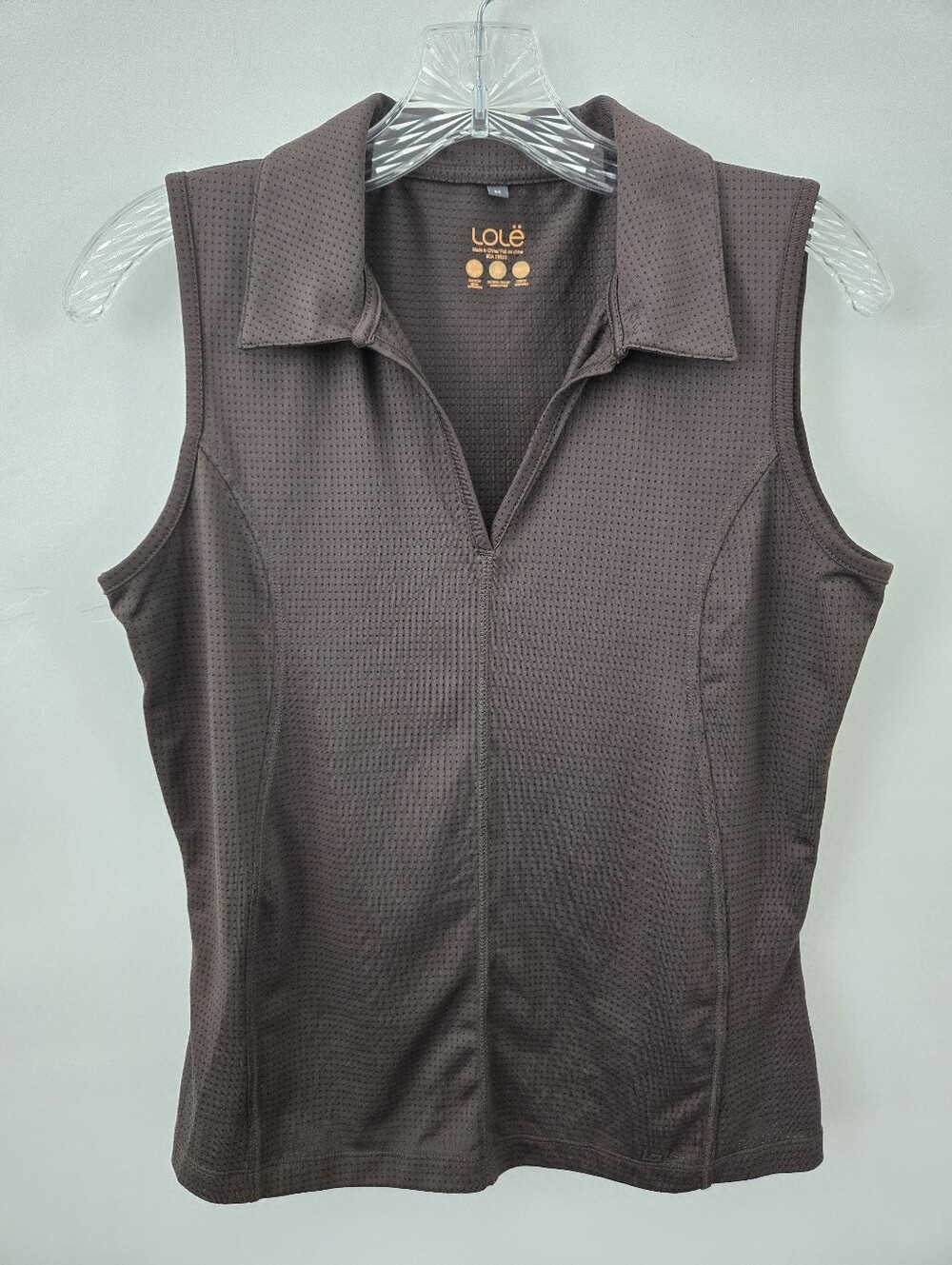Lole sleeveless polo top. Micro-perforated breathable fabric. Brown. Medium.